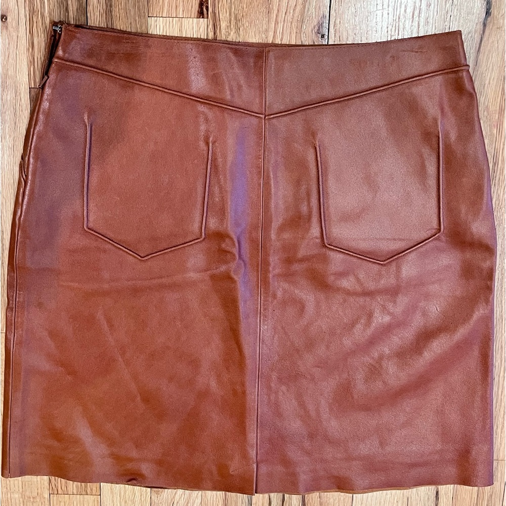 Anne Klein leather skirt , very cool pretend pockets on the back . Mint conditio